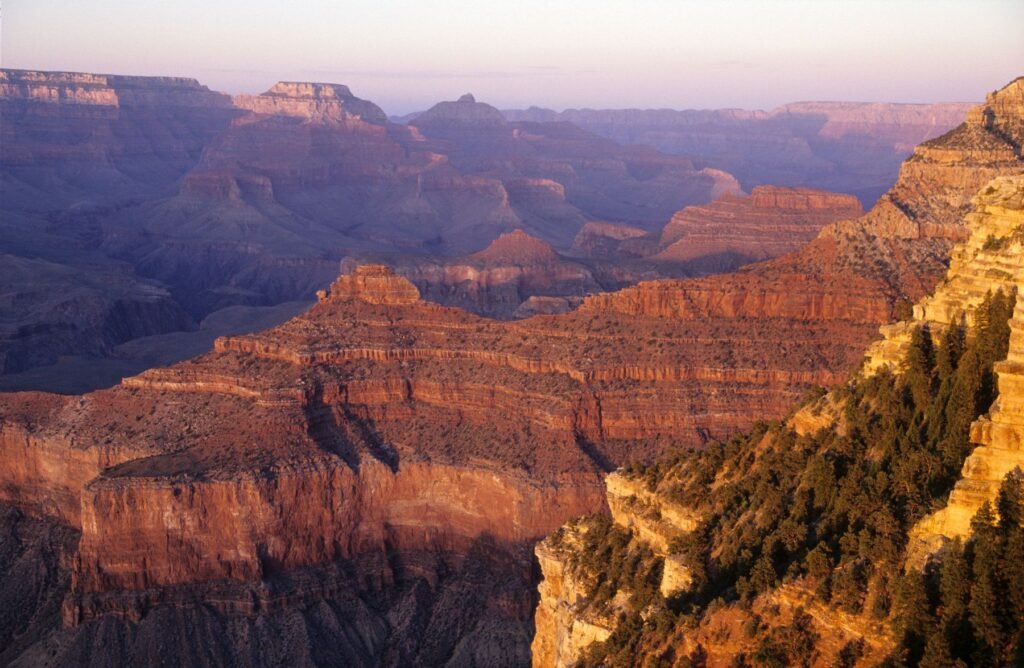 De Grand Canyon bij zonsondergang
